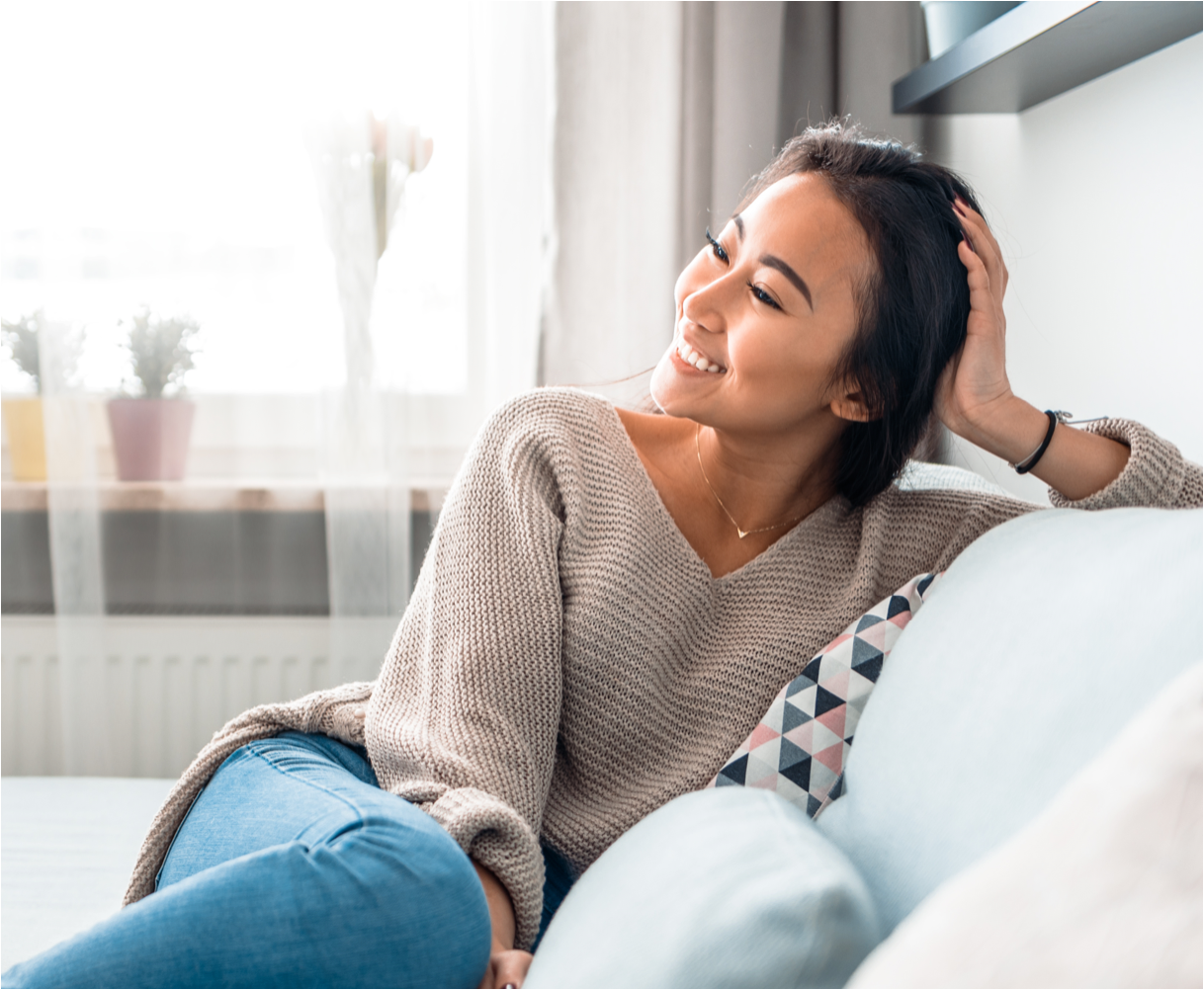 a woman relaxing on a couch